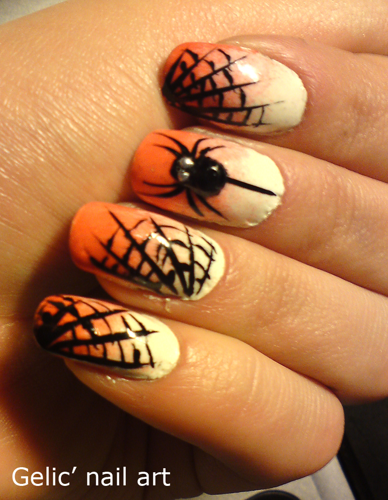 Spook Up Your Look with Halloween Nails: Acrylic Spider Web