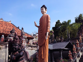 Standing Buddha Statue Give Blessing At Brahmavihara Arama Monastery North Bali