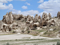 Hobbit warren of pinnacles, caves, homes and churches in Cappadocia -- near Goreme, Turkey