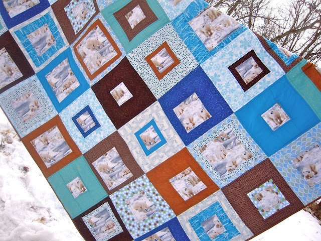 http://sewinsomethin.blogspot.com/2015/12/jjs-polar-bear-quilt.html