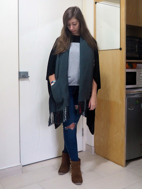 Rough Around the Edges | casual outfit of grey t-shirt, black cape cardigan, cosy checked scarf, ripped jeans and brown ankle boots