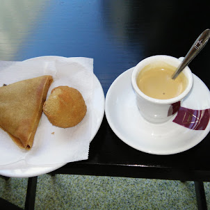"Samosa  and Coffee at "0 Sinal" restaurant in Lisbon.