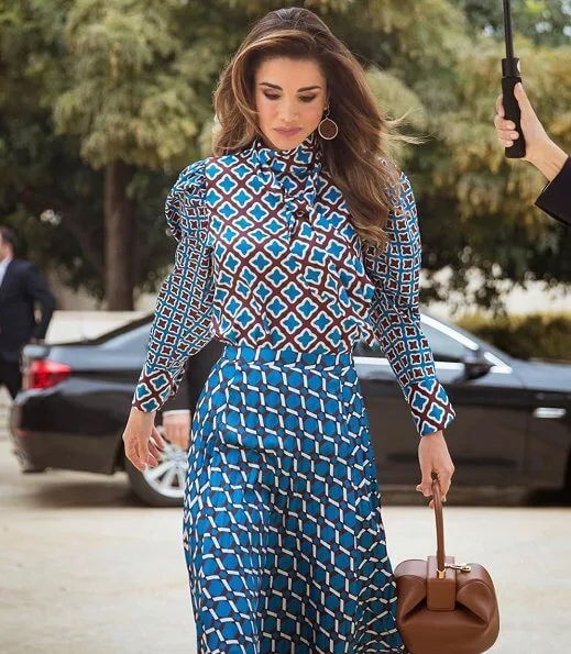 Queen Rania of Jordan wore a new printed satin top and blouse by Zara. 14th Teacher Award and 6th Principal Award