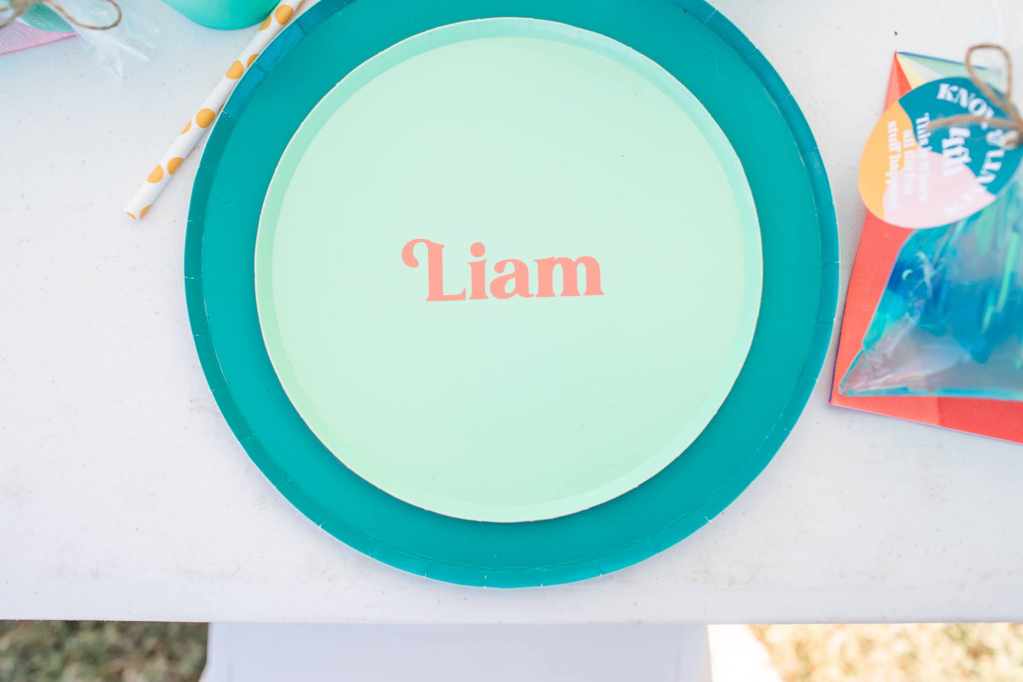 Kids birthday party place setting with DIY names and table decor