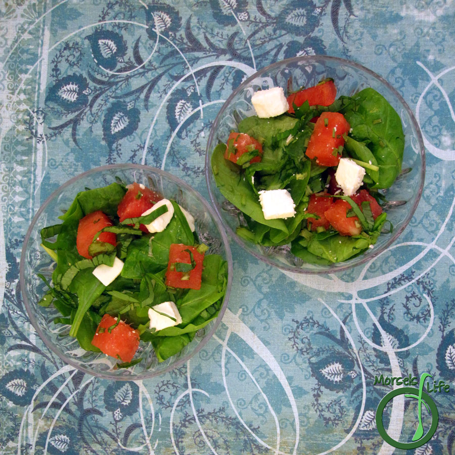 Morsels of Life - Watermelon Feta Spinach Salad - Combine some sweet watermelon with savory feta cheese, flavored up with some basil in a bed of spinach and make yourself a watermelon spinach feta salad. Drizzle some balsamic on top if you're feeling fancy!