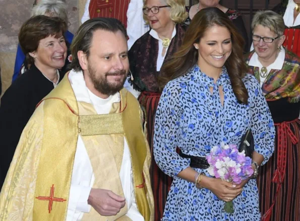 Princess Madeleine of Sweden attends Jarvsomassan a folk fair for musicians Hedvig Eleonora Church in Östermalm. Princess Madeleine wore Alice Temperley Leopard Print Dress