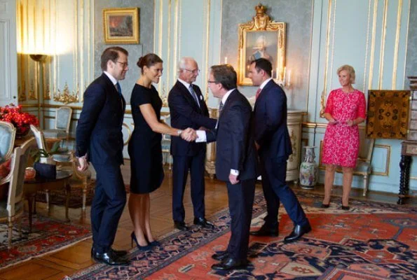 Crown Princess Victoria wore Escada dirtes ruffled wool dress for diplomatic reception at Royal Palace. Prince Daniel