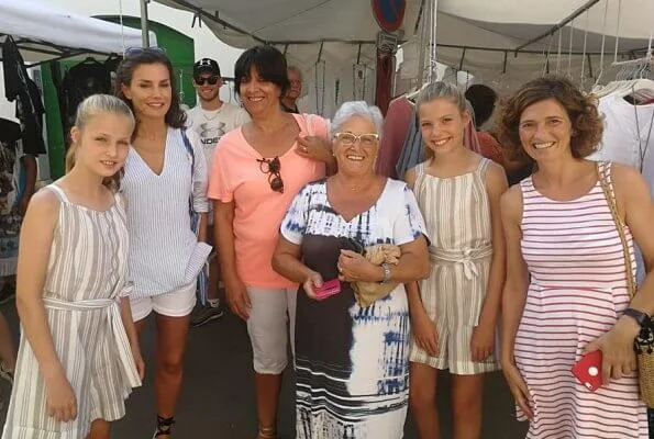 Crown Princess Leonor and Infanta Sofia wore a new linen blend striped jumpsuit by Mango and RIia Menorca Pau sandals