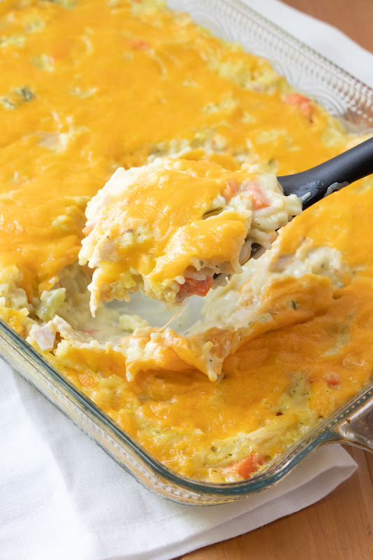 Dinner doesn't get much better than this delicious comfort food casserole! It's packed with carrots, green pepper and onion and uses easy ingredients like leftover rotisserie chicken, rice a