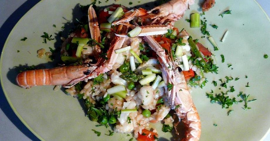 Kulinarische Welten zu Fisch- und Meeresfrucht: Paella mit Kaisergranat