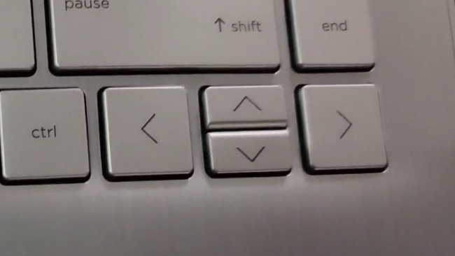 Small and very closely placed 2 arrow keys of HP 14s dr1009tu laptop.