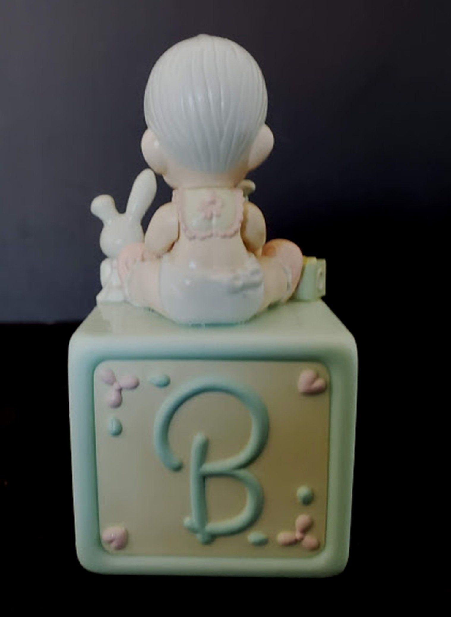 Enesco musical animated baby figurine