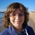 Headshot of Rachel Knowles author with sea in background (2021)