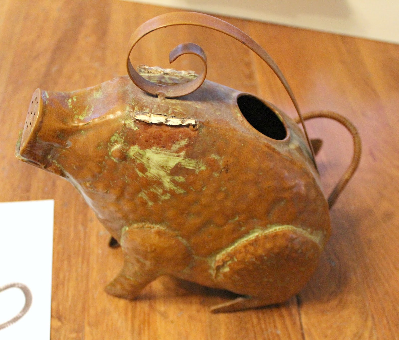 Upcycling An Earless Goodwill Pig Watering Can Organized Clutter