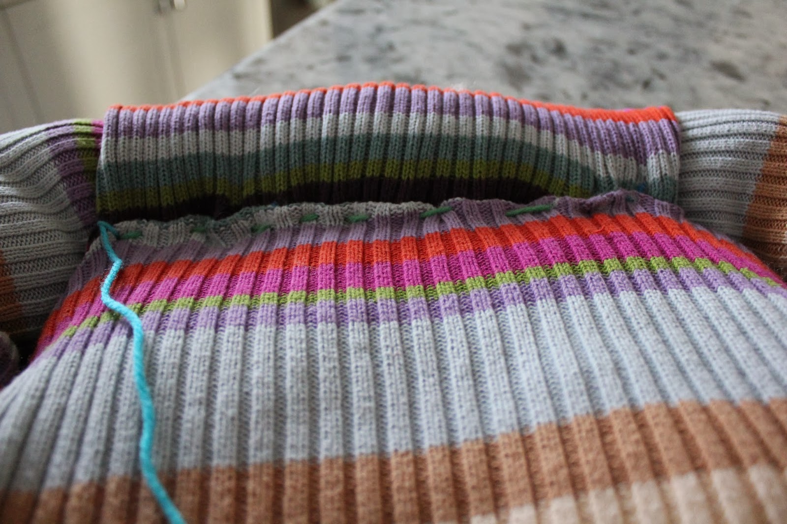 Upcycle Old sweater into cute pet bed
