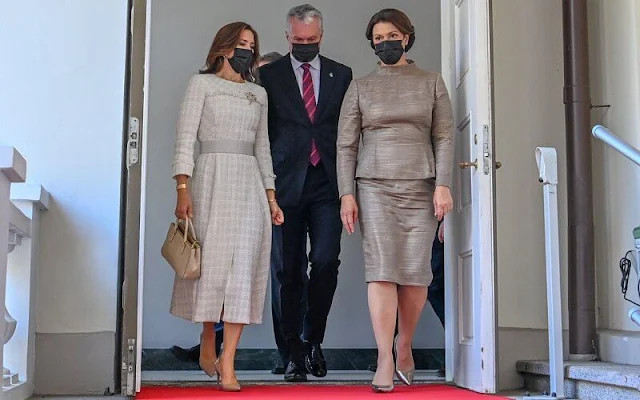 Lithuania’s President, Gitanas Nauseda, and his wife, Diana Nausediene. Crown Princess Mary wore a tweed dress