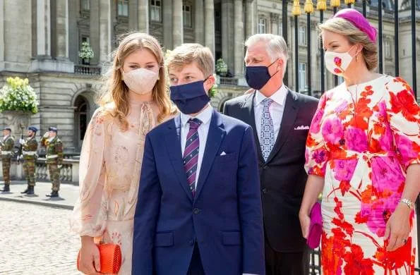 Queen Mathilde wore a new fuchsia dress by Dries Van Noten. Princess Elisabeth, Prince Gabriel, Princess Eleonore, and Princess Astrid