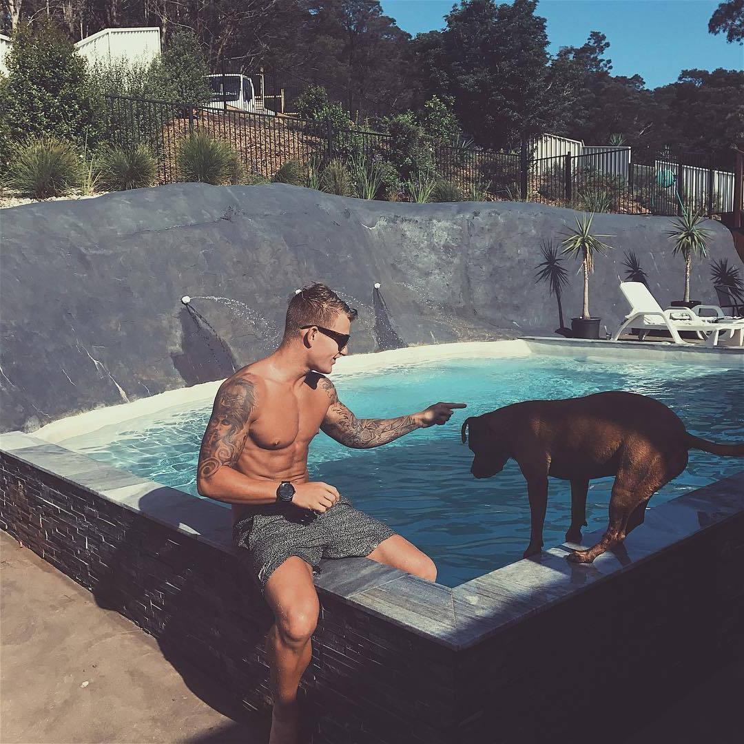 trashy-american-tattoo-dude-sunglasses-sunny-summer-pool-dog-pet