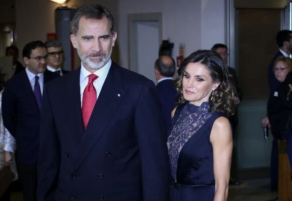 Queen Letizia wore Nina Ricci blue pumps, she carried Felipe Varela clutch bag. Carolina Herrera lace and satin blue dress, diamond earrings