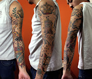 . flower tattoo . flower arm sleeve tattoo . upper sleeve tattoos . floral . kellyguysleeve
