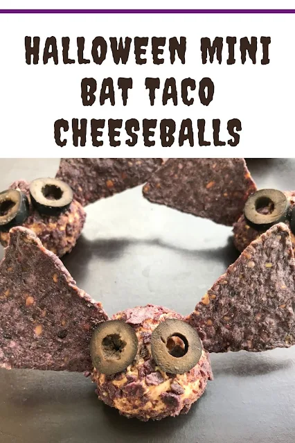Mini bat taco cheese balls on a platter.