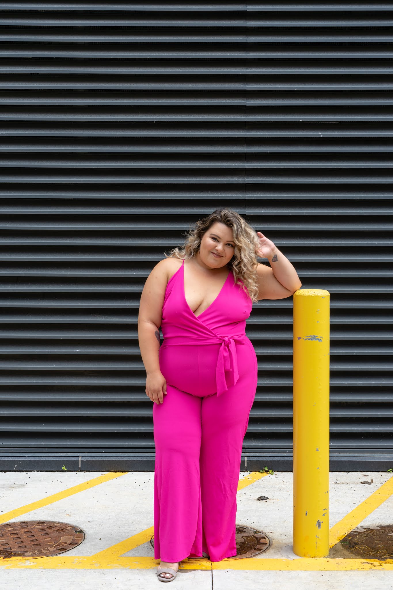 Chicago Plus Size Petite Fashion Blogger reviews a Fashion Nova Curve Jumpsuit and talks about embracing her lower tummy and curves.