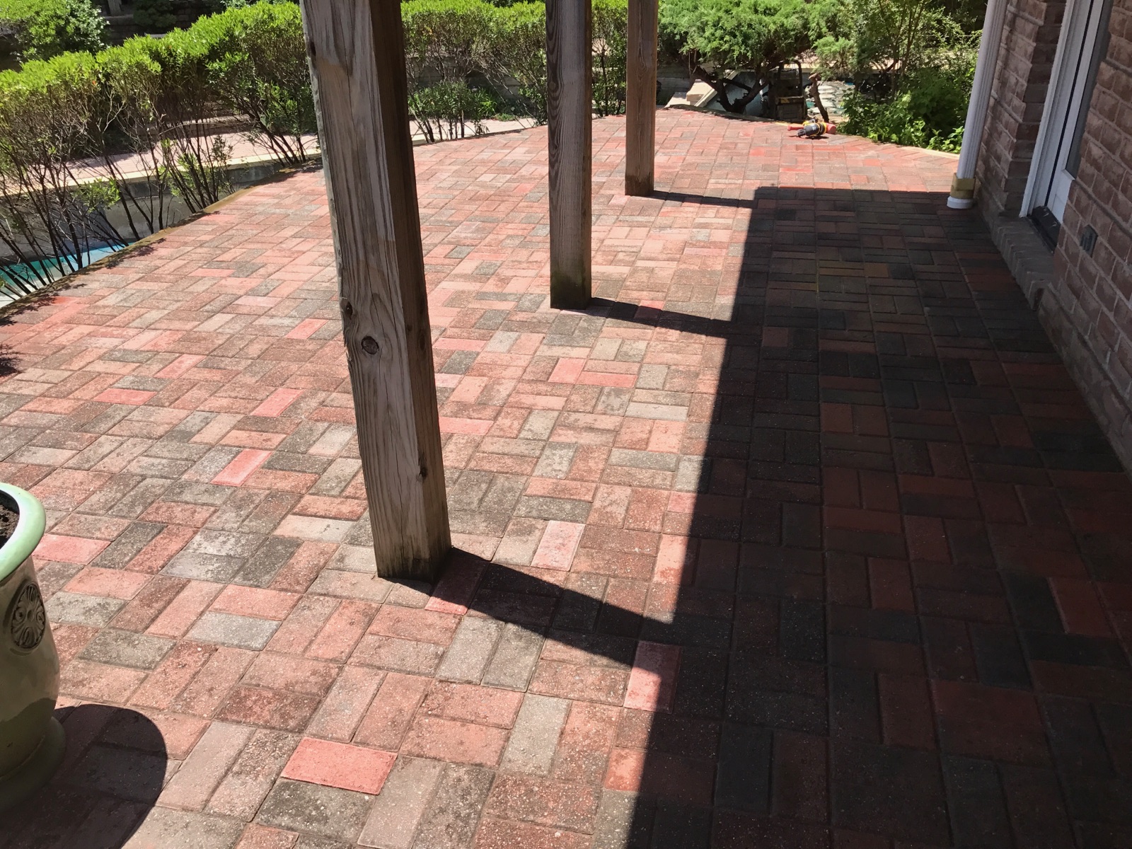 Custom Stoneworks & Design Inc. 4x8 traditional paver patio under a