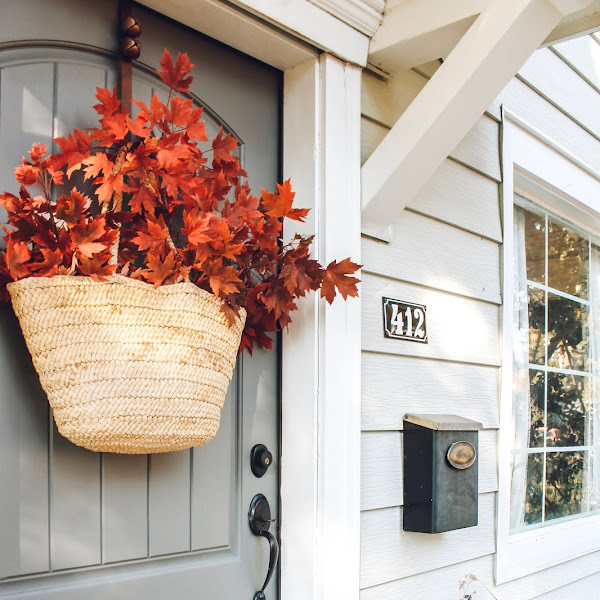 Bag Full of Fall Leaves Hanging on our Front Door