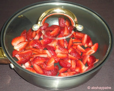 sliced strawberries in a pan