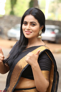 Poorna in Cute Backless Choli Saree Stunning Beauty at Avantika Movie platinum Disc Function ~  Exclusive 014