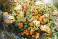 Mixing vegetables with masala for veg biryani recipe