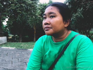 Woman With Glum Face In The Garden Of The Park In The Afternoon At Badung, Bali, Indonesia