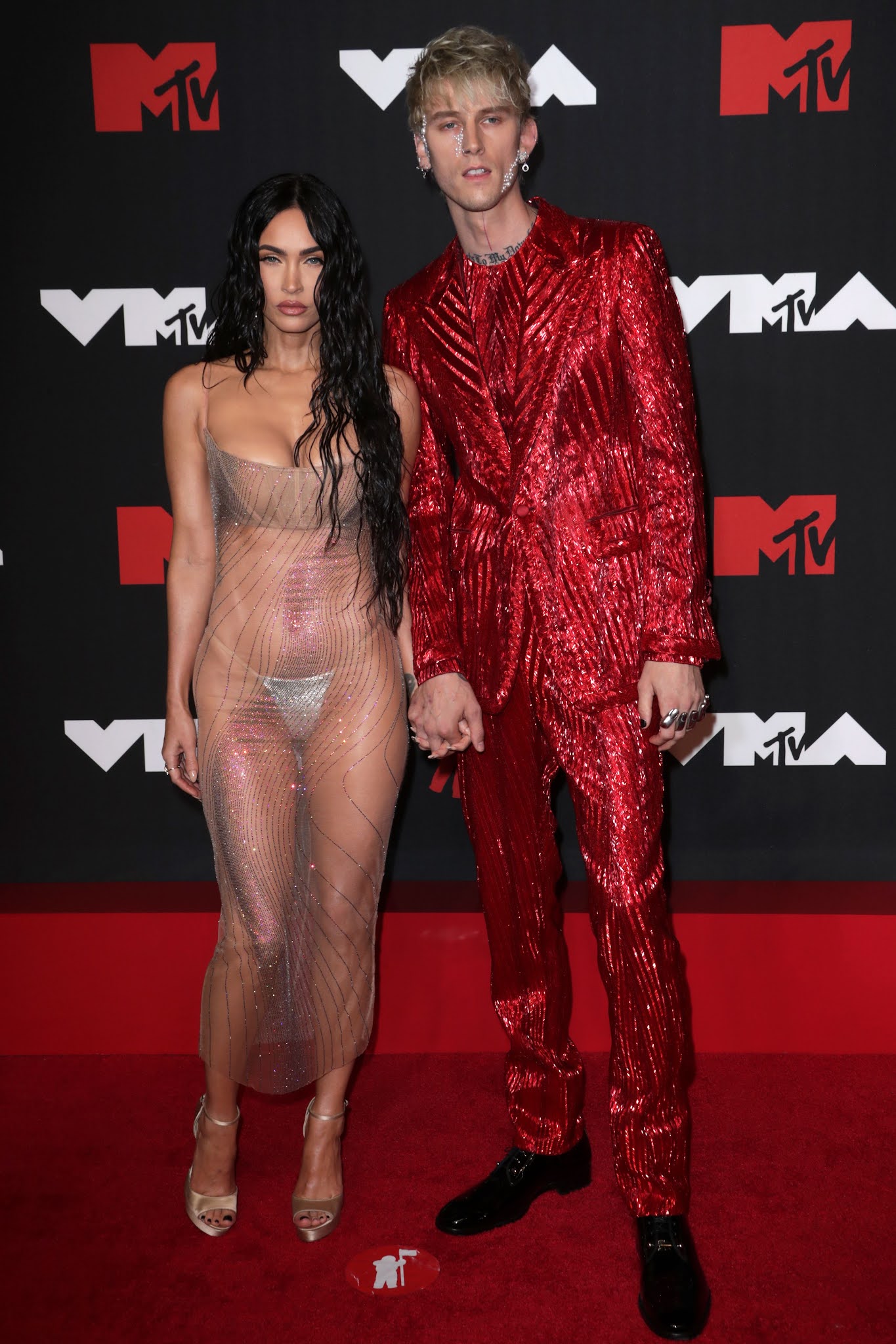 Megan Fox in bold see-through dress for 2021 MTV VMAs with Machine Gun Kelly