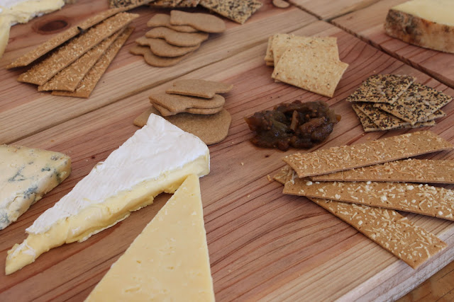 Cheese board with biscuits by Fudges.
