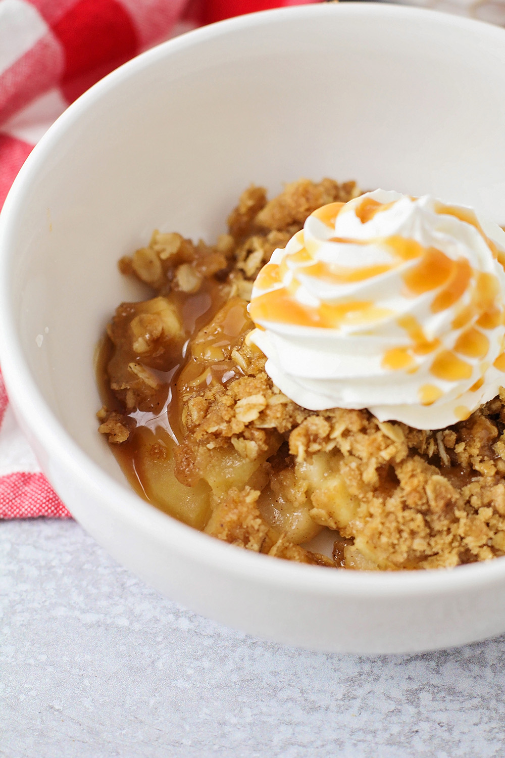 This delicious apple crisp has tender juicy apples topped with buttery and sweet crisp topping. It's the perfect fall dessert!