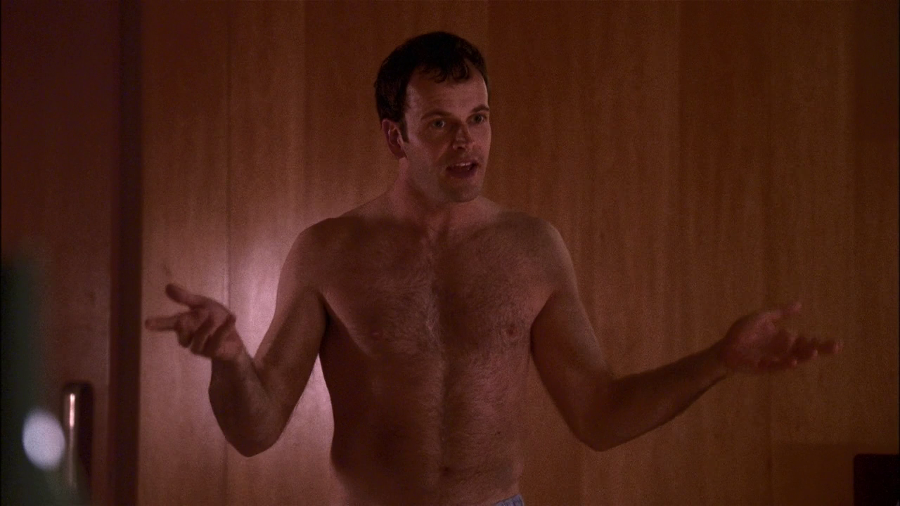 Jonny Lee Miller shirtless in Eli Stone 1-01 "Pilot" .