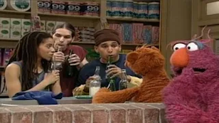 Baby Bear and Stomp patrons make music with the bottles. Telly still prefers his tuba. Sesame Street Let's Make Music