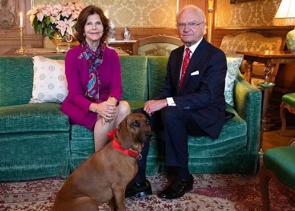 King Carl Gustaf and Queen Silvia traditionally celebrate Christmas at Drottningholm Palace. he photo also shows the King's dog Brandie