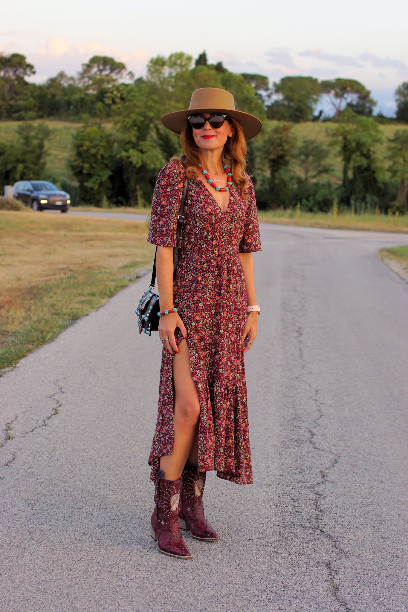 A transitional western style outfit with a ba&sh Paris dress and Lack of Color hat