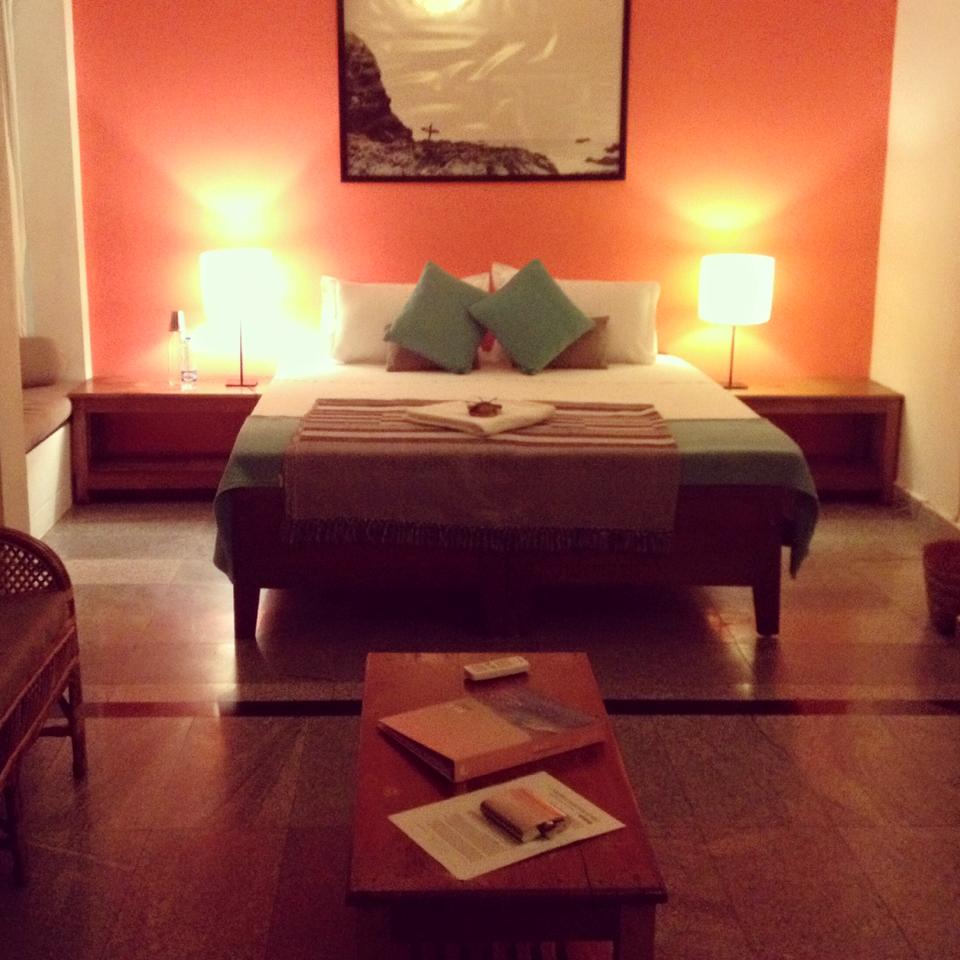 bedroom orange wall soul and surf varkala india