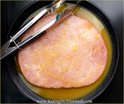 Marinated Grilled Ham Steak, cooked ham steak marinated and grilled for a fast, flavorful easy dinner | Recipe developed by www.BakingInATornado.com | #reciepe #dinner