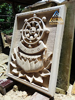 Ukiran batu alam paras jogja (batu putih) Gambar Roda dharma