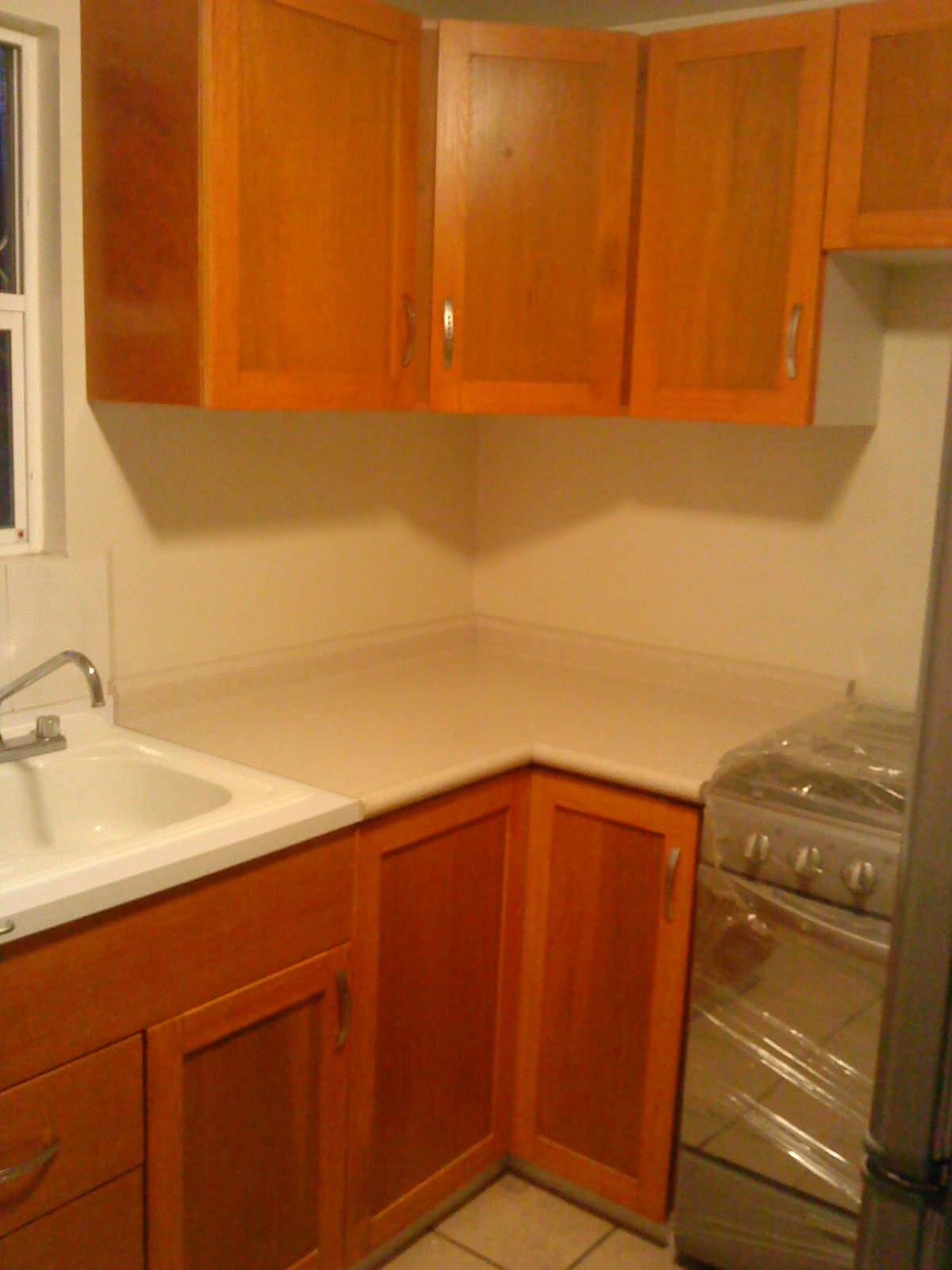 Cocinas integrales y closets.: Cocina Integral (col. héroes de puebla).