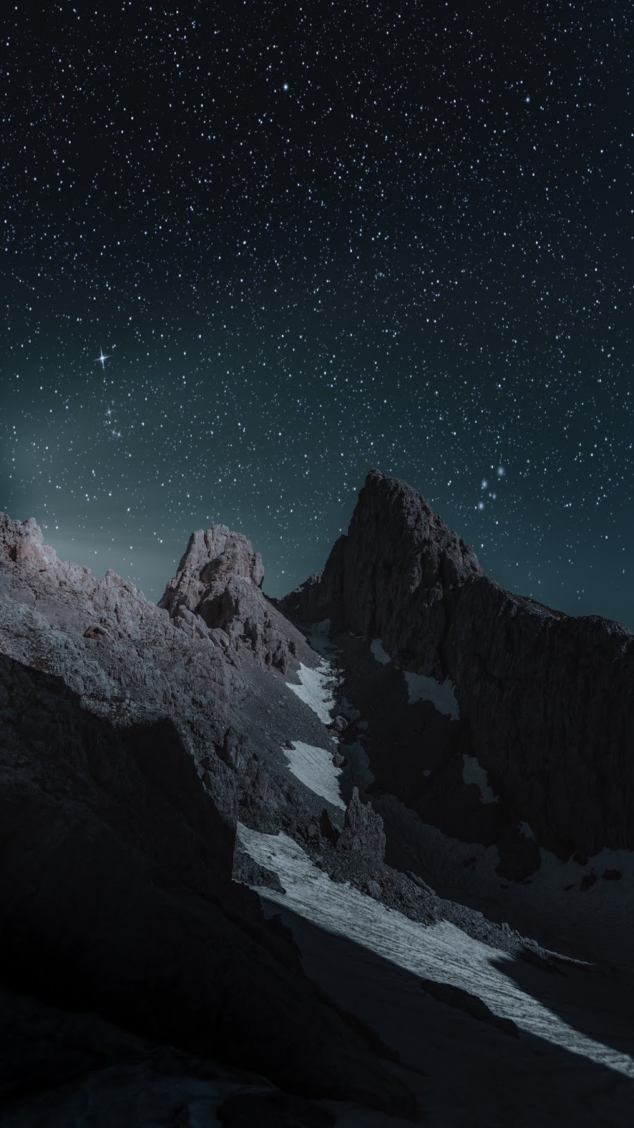 Starry night over mountains
