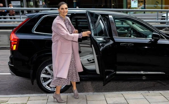Crown Princess Victoria wore a Pattriina floral print long dress from Andiata and Victoria wore an Odnala  wool cashmere jacket from Andiata