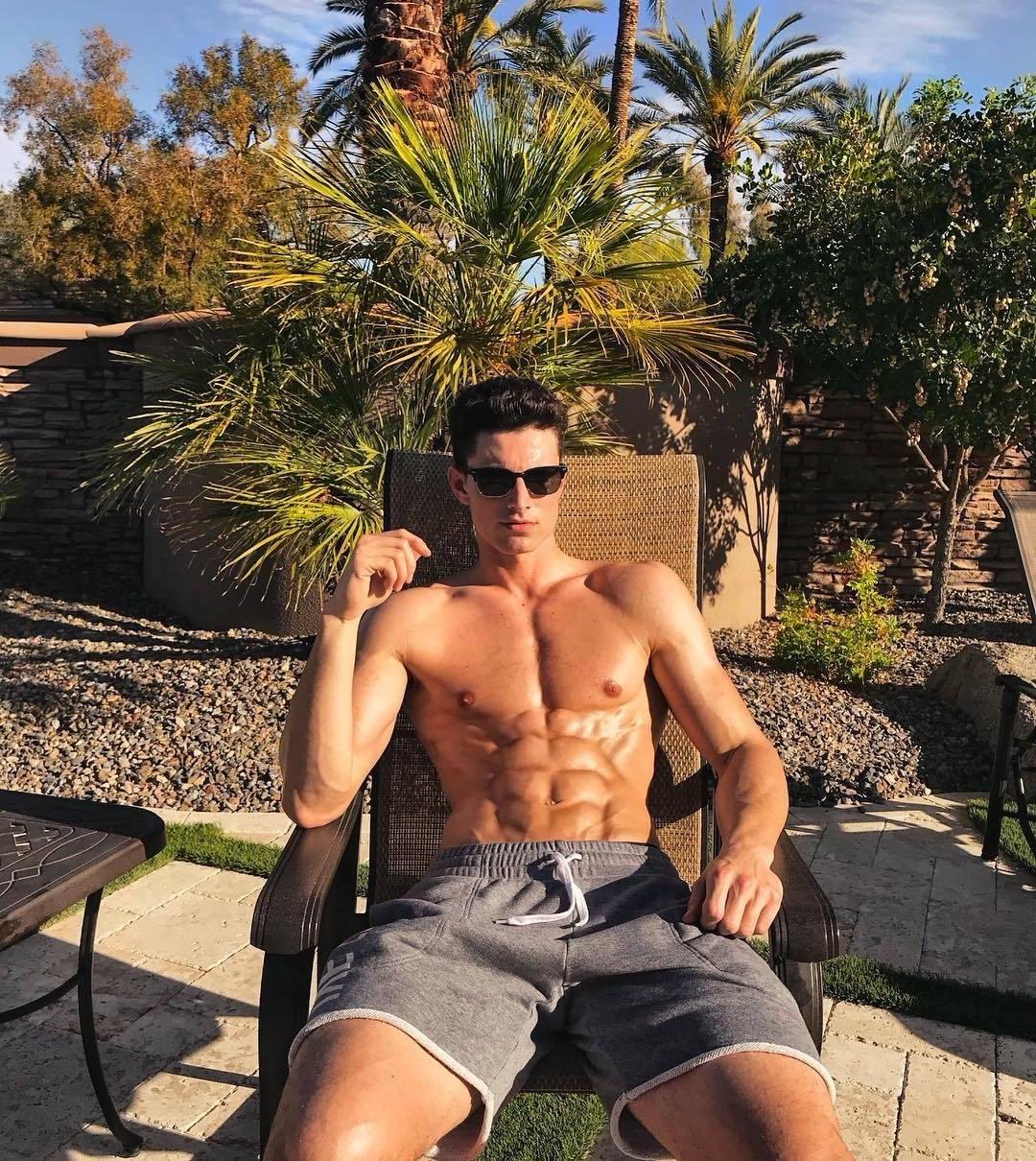 hot-bad-boys-sunglasses-ripped-sixpack-abs-tanning-cocky-male-model