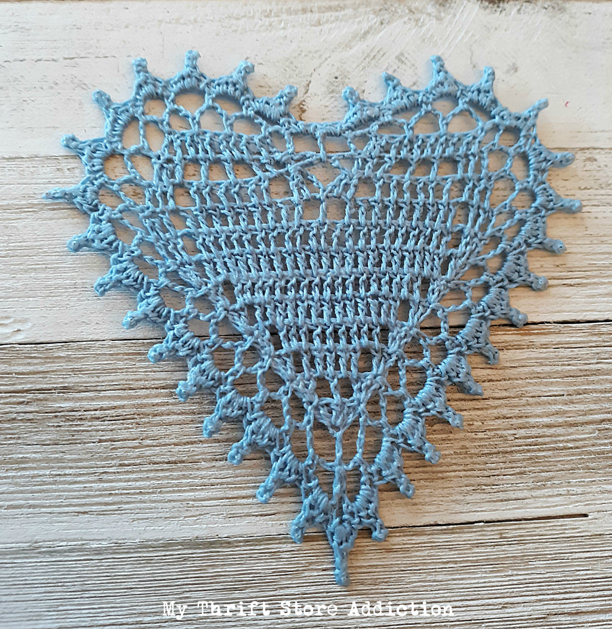 crocheted heart doily