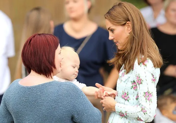 Kate Middleton wore Emilia Wickstead Aurora belted floral-print Swiss-dot cotton-blend seersucker dress and Monsoon fleur wedges