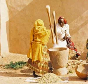 Pounding grain in Benin