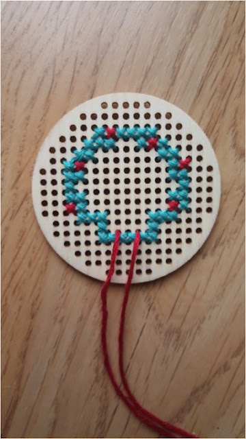 Cross stitched wooden Christmas wreath ornament - with free pattern